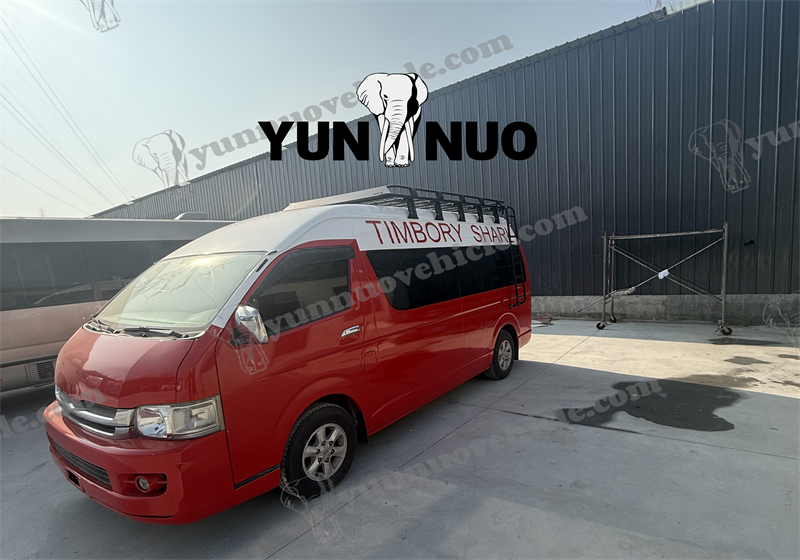 The eye-catching red used Toyota HiAce is customized for the Malian client副本